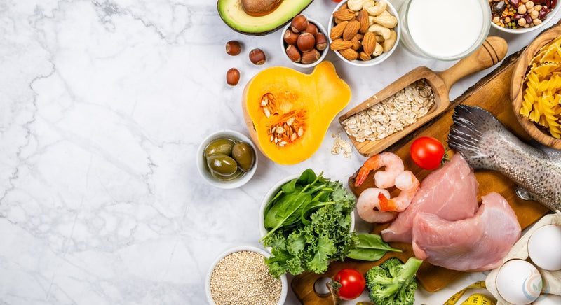 Mediterranean diet food laid out on a marble table